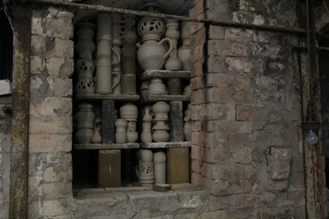 Fully packed bisque chamber of wood-fired kiln