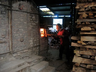 Robb firng an Irish wood-fired kiln in Co.Cork Ireland